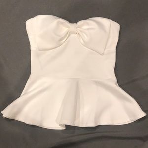 White peplum top
